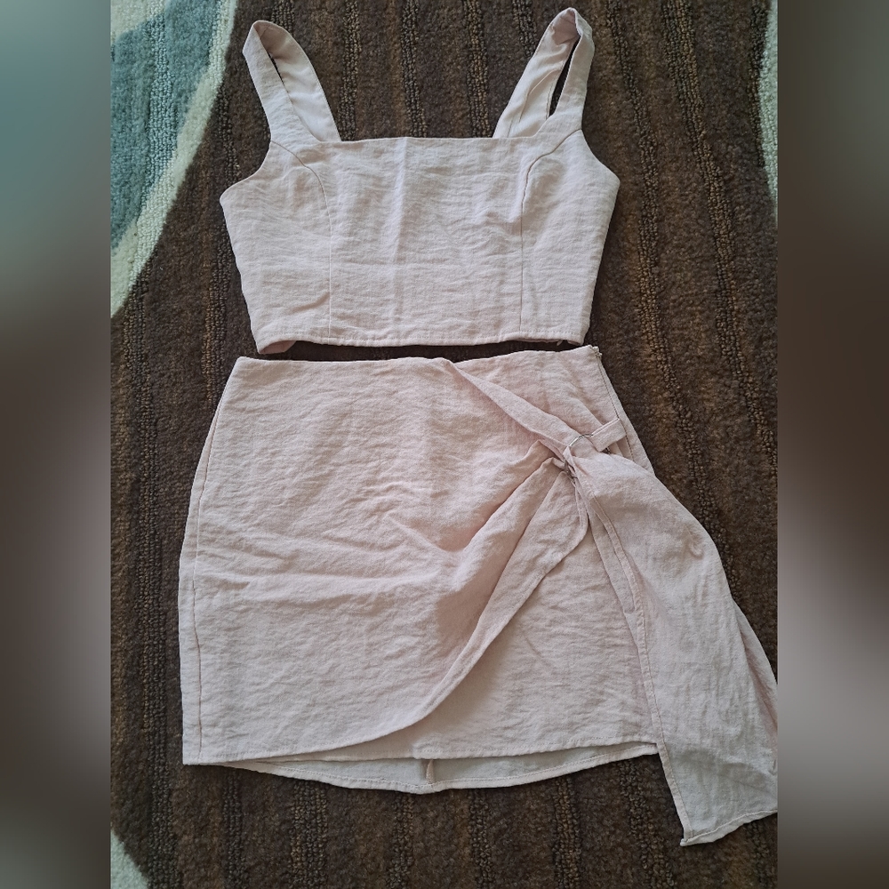 MiniSkirt set Never worn. Large. Peach color. Not faded that's just the picture